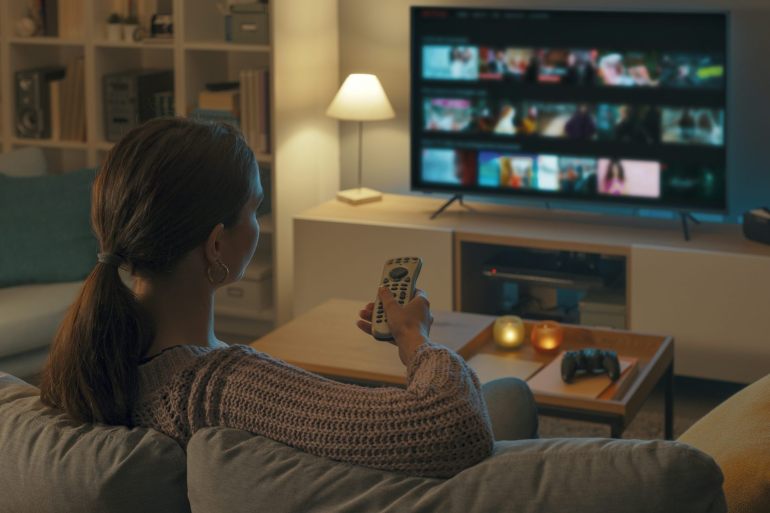 Woman watching TV.